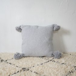 Pompom blanket cushion gray