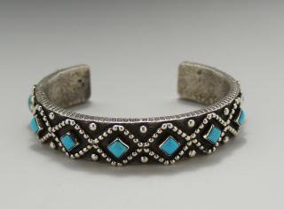 Navajo Ernest Rangel Kingman Turquoise Row Tufa Cast Bracelet