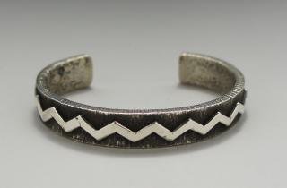 Navajo Ernest Rangel Lightning Design Tufa Cast Bracelet